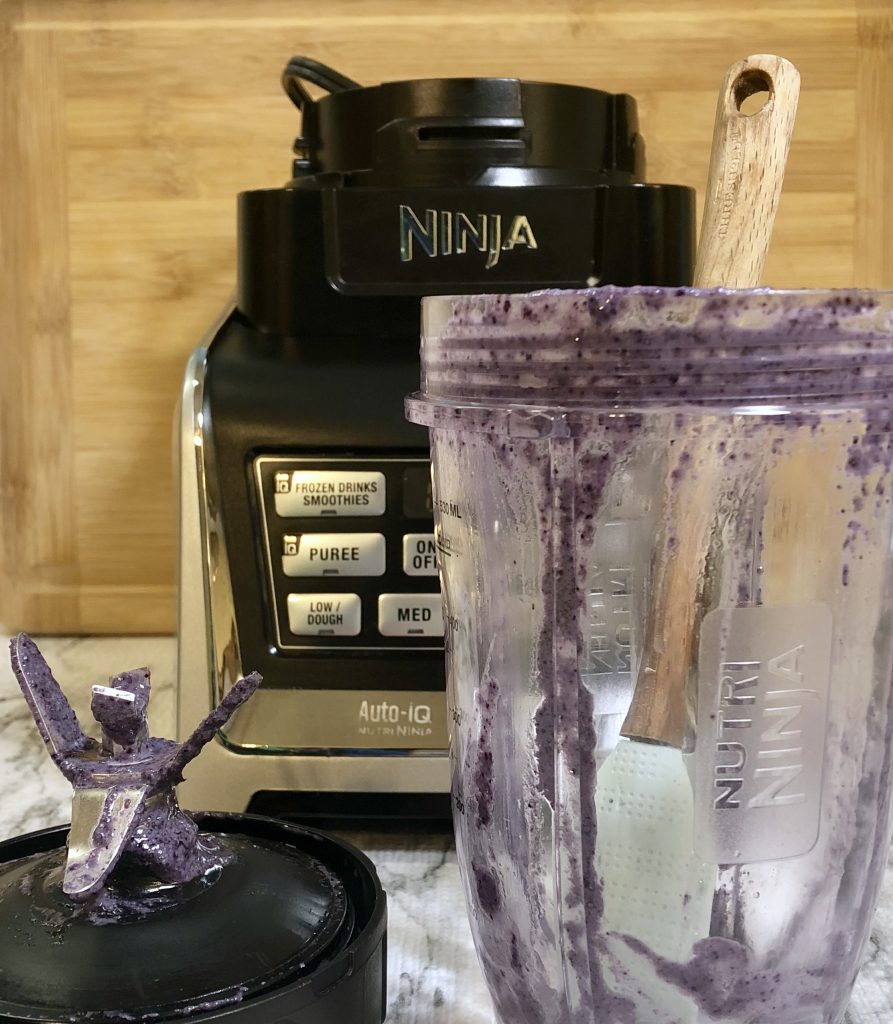 Ninja base with cup with only the remains of a Hyman Inspired Superfood Shake