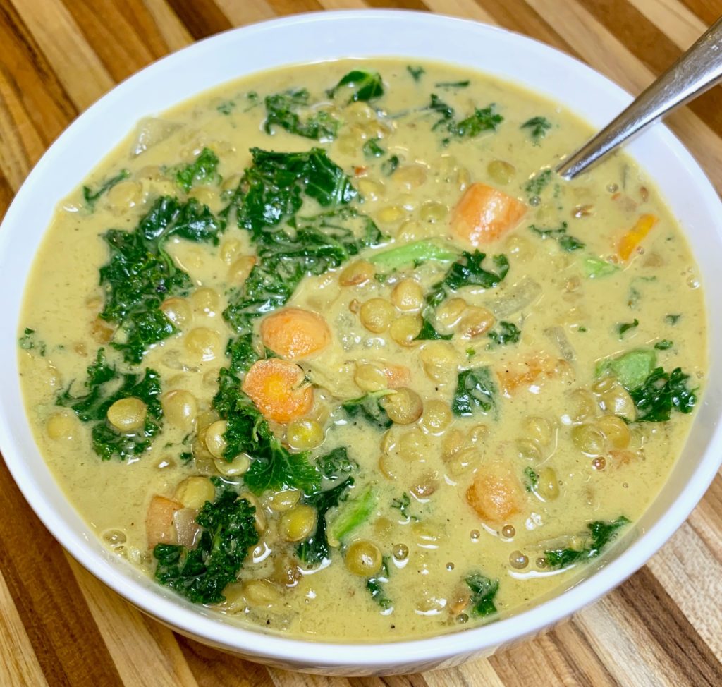 A full bowl of Curry Kale & Lentil Soup