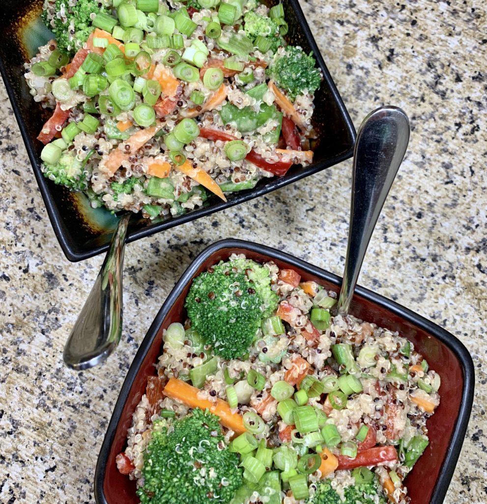 Two square bowls of Thai Quinoa Salad with Peanut Sauce. 